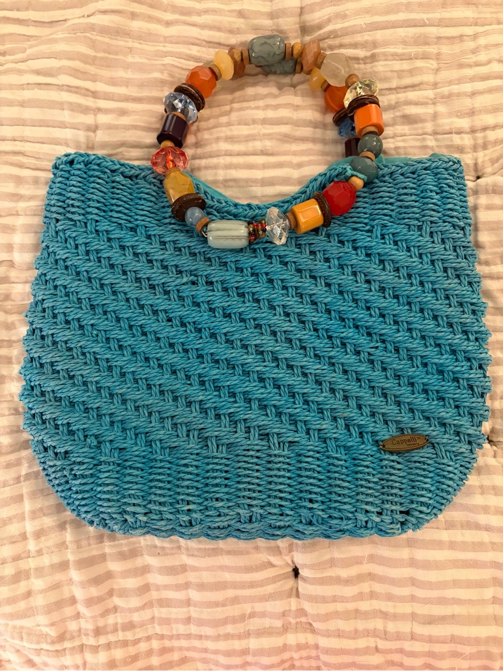 Turquoise Capelli straw handbag with beaded handle